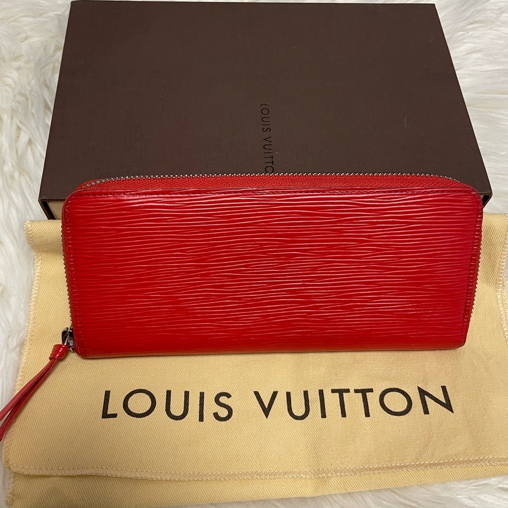 Sold! Louis Vuitton Epi zipped Wallet